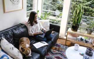 woman working from home on the couch