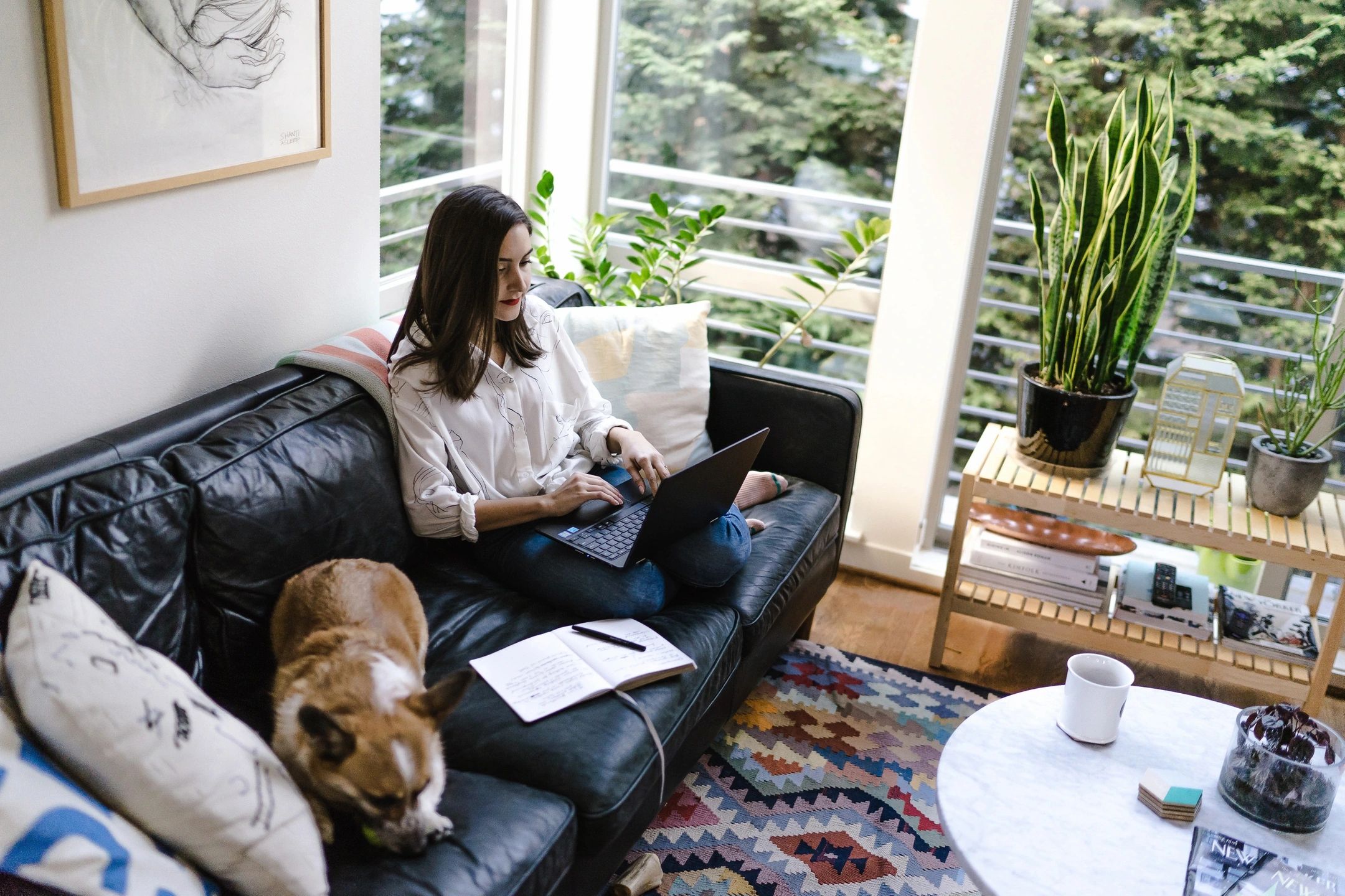 woman working from home on the couch